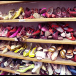 High heels and pumps in disarray in the closet