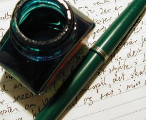 Green fountain pen with refillable ink