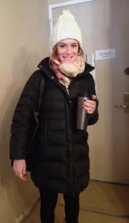 Erin arriving for work with reusable Starbucks coffee mug in hand. (Image: J. Ottman)