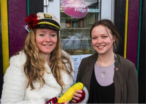 Esther Deeks and Anna Francis, resilience officer of Frome Town Council, celebrate the launch of the Frome Community Fridge, a project designed to cut down on food waste, while benefitting the needy.