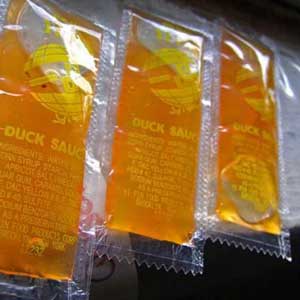 Wasteful single serving individual duck sauce packs
