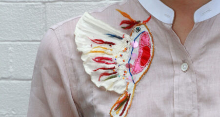 Visible Mending Bird Embroidered On a Shirt By Jussara Lee