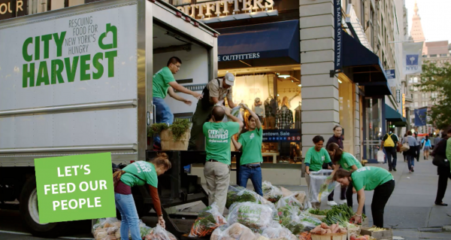 NYC kids load a City Harvest Truck for Food Donation